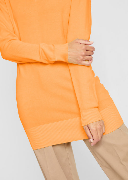 Klasičen dolg pulover z V-izrezom