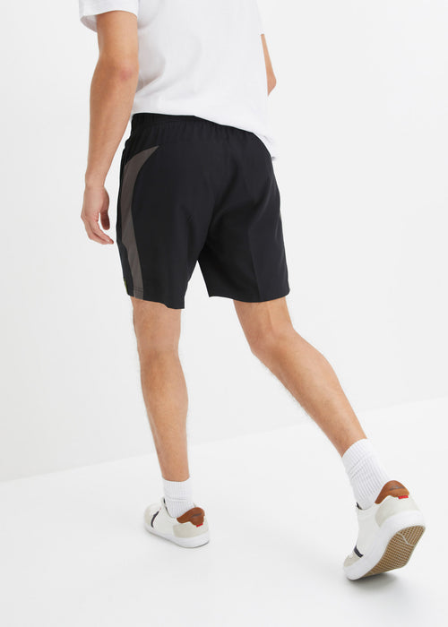 Športne kratke hlače z žepi z zadrgami iz hitro sušečega materiala