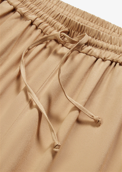 Široko krojene hlače s cargo žepi z visoko krojenim okrog in okrog elastičnim pasom