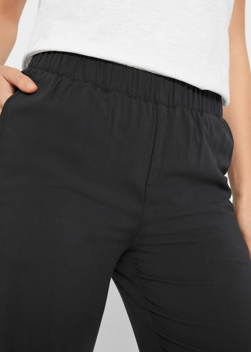 Viskozne udobne hlače z vpeljano elastiko okrog in okrog in širokimi hlačnicami