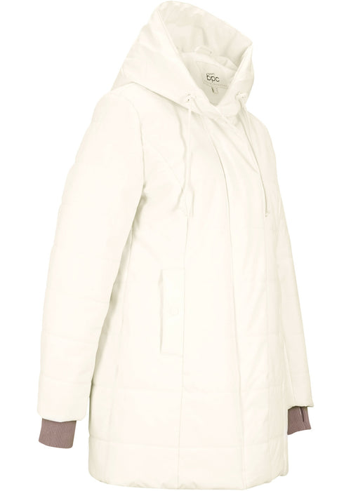 Dolga prešita jakna s kapuco z recikliranim poliestrom