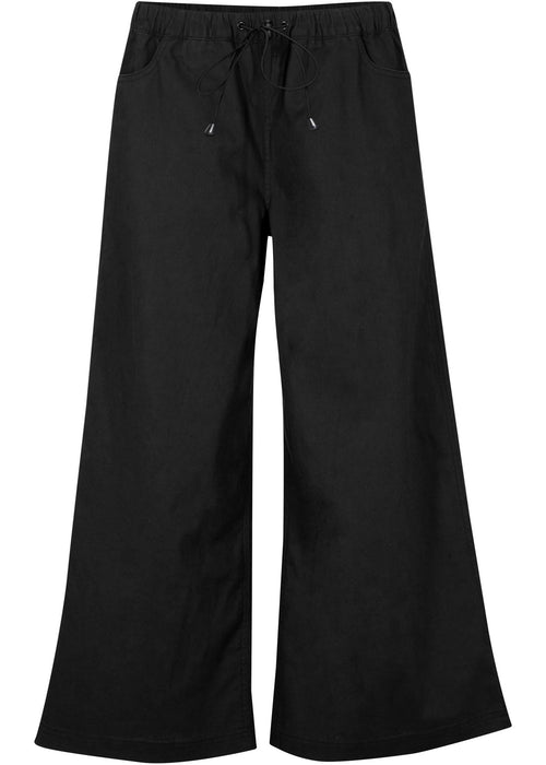 Široke pletene udobne hlače z elastiko okrog in okrog pasu