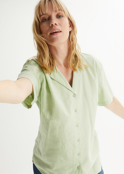 Ohlapna bluza s trajnostnim lanom in kratkimi rokavi