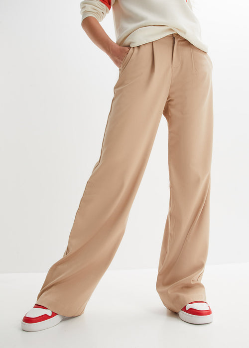 Široke hlače z všitki v pasu