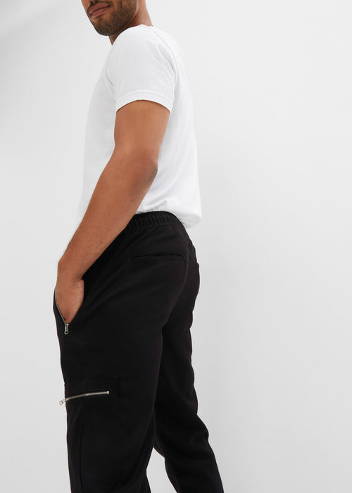 Klasične stretch hlače brez zapenjanja z zadrgami v spodaj ozkem kroju