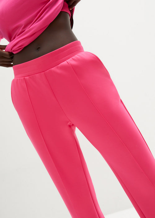 Funkcijske jogging hlače s širokimi hlačnicami iz hitro sušečega materiala