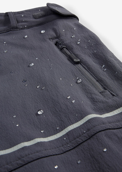 Stretch softshell hlače z odsevnimi detajli iz vodoodpornega materiala