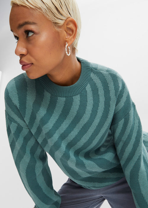 Pleten pulover z vzorcem valov